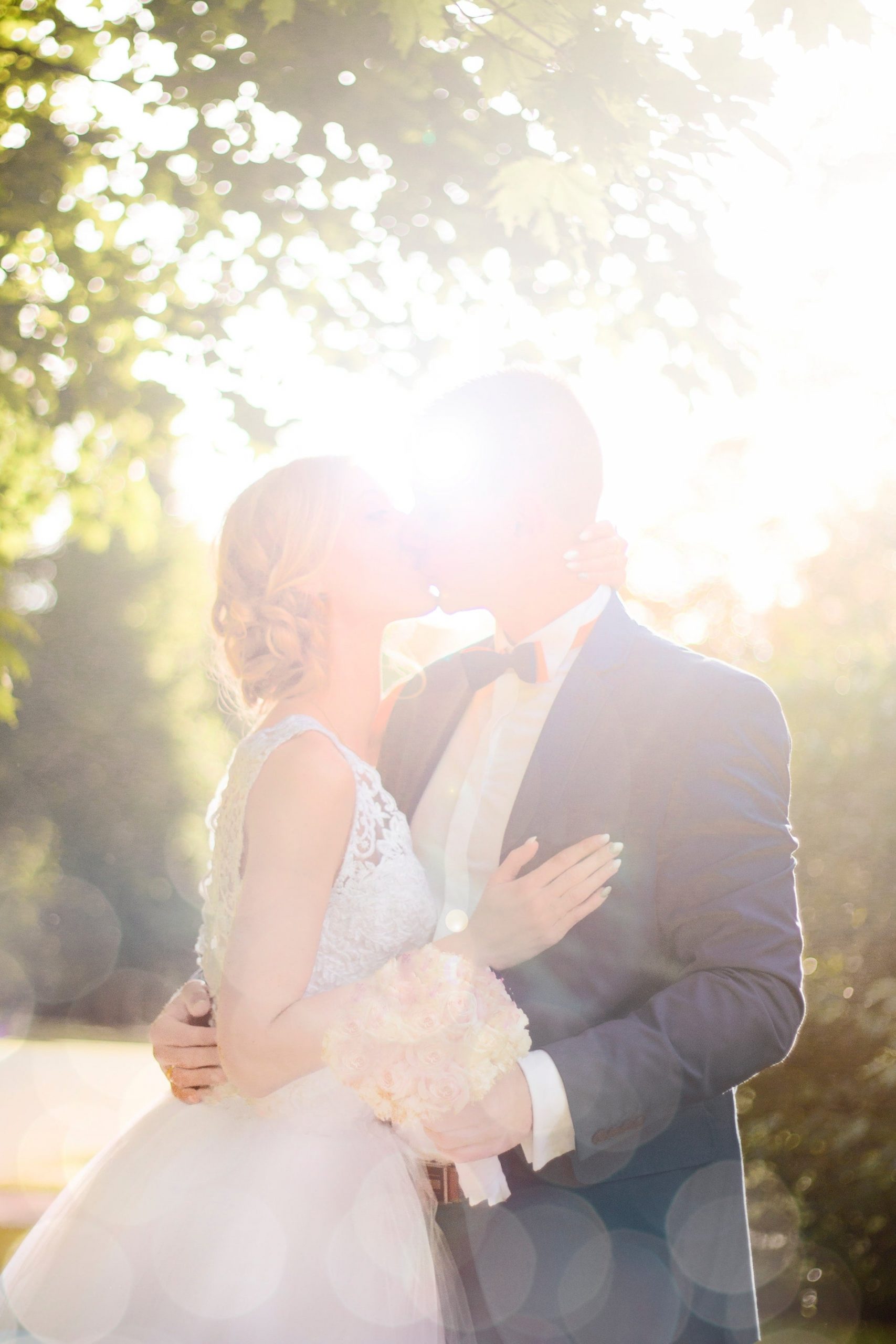 Newly Wed Hugging & Kissing with Sun Exposure